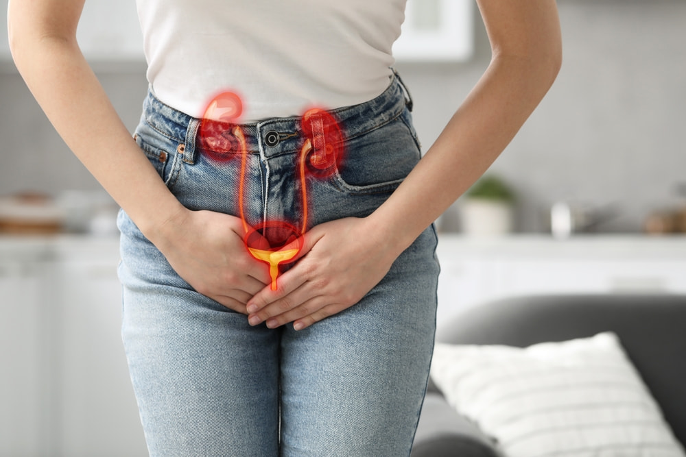 Mulher com sintomas de infecção urinária.